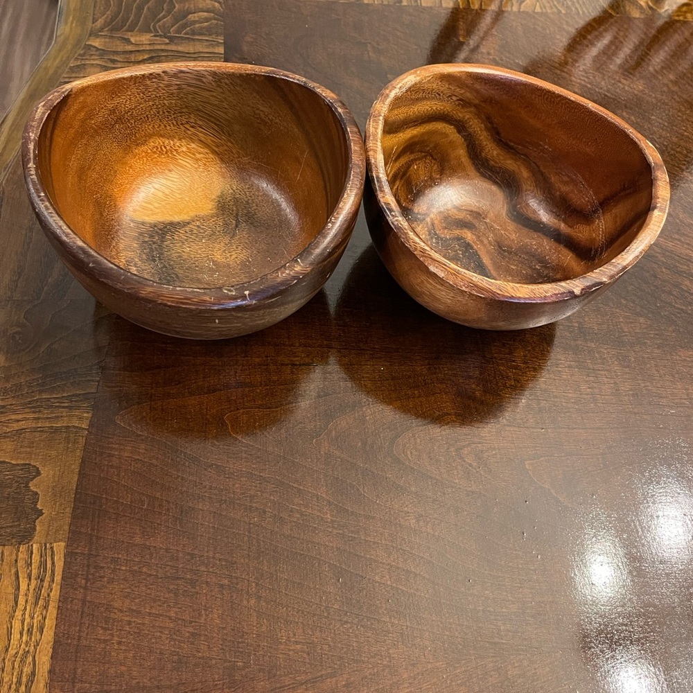 Two wood salad bowls